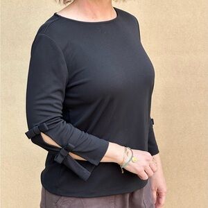 Elegant Black Top with Bow Accents